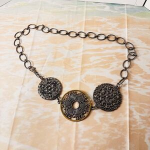 Chico’s Statement Boho Belt Metal is gold and silver